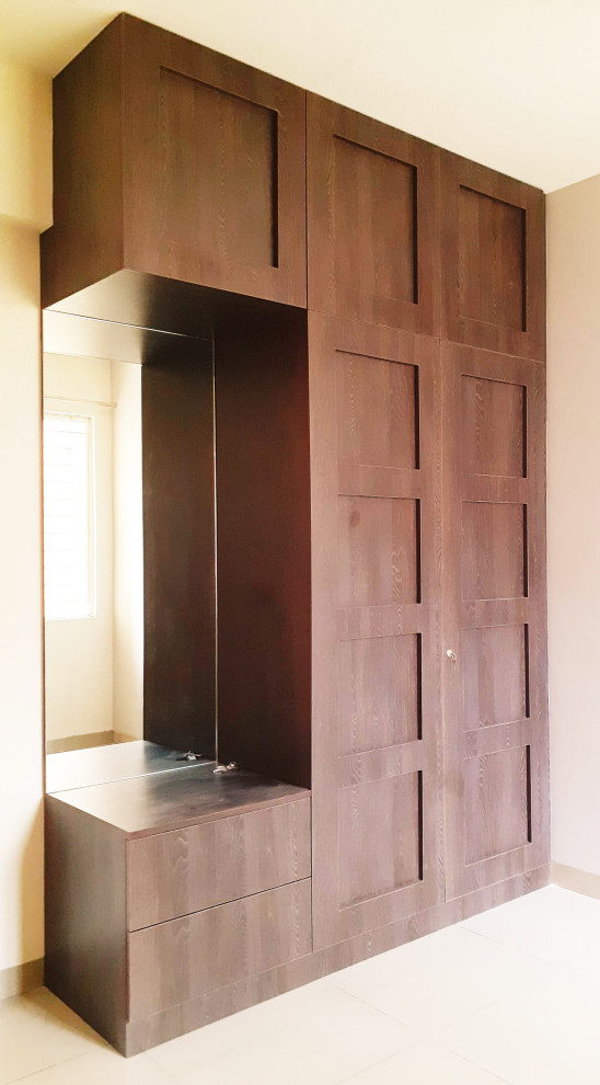 This is an example of a contemporary wardrobe in Bengaluru.