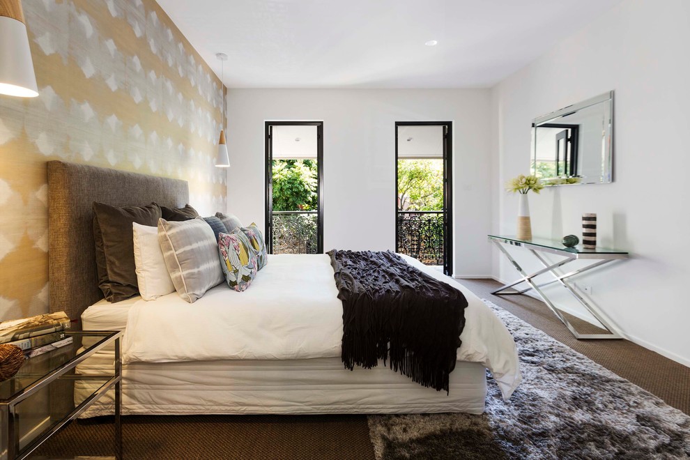 Mid-sized contemporary master bedroom in Sydney with white walls, carpet, no fireplace and brown floor.