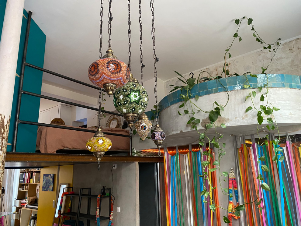 Transformation d'un local en loft brutaliste tropical