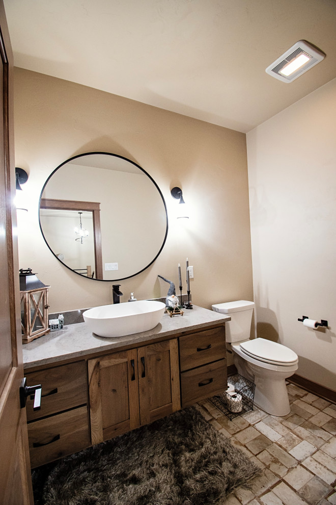 Inspiration for a large rustic ceramic tile, multicolored floor and single-sink bathroom remodel with flat-panel cabinets, medium tone wood cabinets, a two-piece toilet, beige walls, a vessel sink, quartzite countertops, multicolored countertops and a floating vanity
