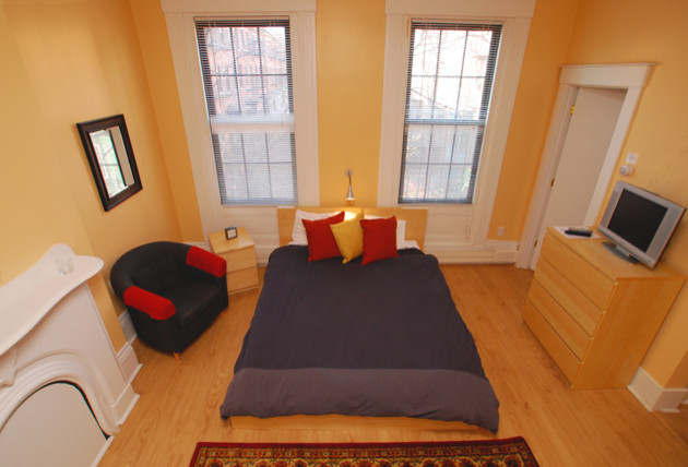 This is an example of a contemporary bedroom in Boston.