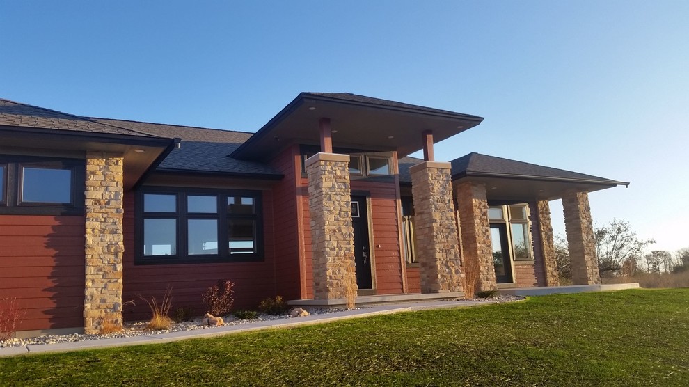 Home design - mid-sized modern one-story wood red home design idea with a hip roof and a shingle roof