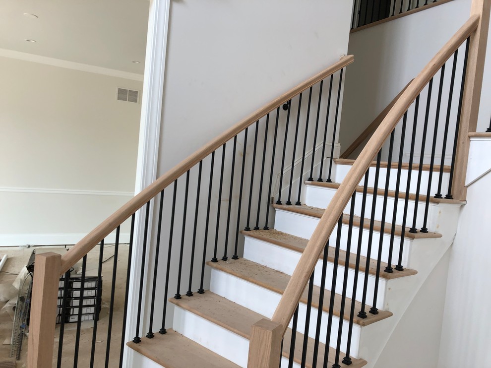 Inspiration for a small wood l-shaped staircase in Tampa with wood risers and mixed railing.