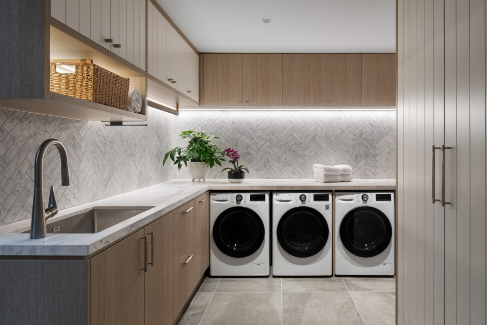 Photo of a transitional laundry room in Melbourne.