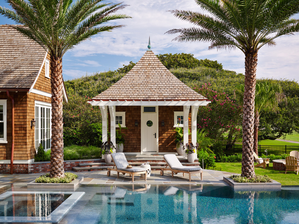Inspiration for a traditional pool in Jacksonville with a pool house.