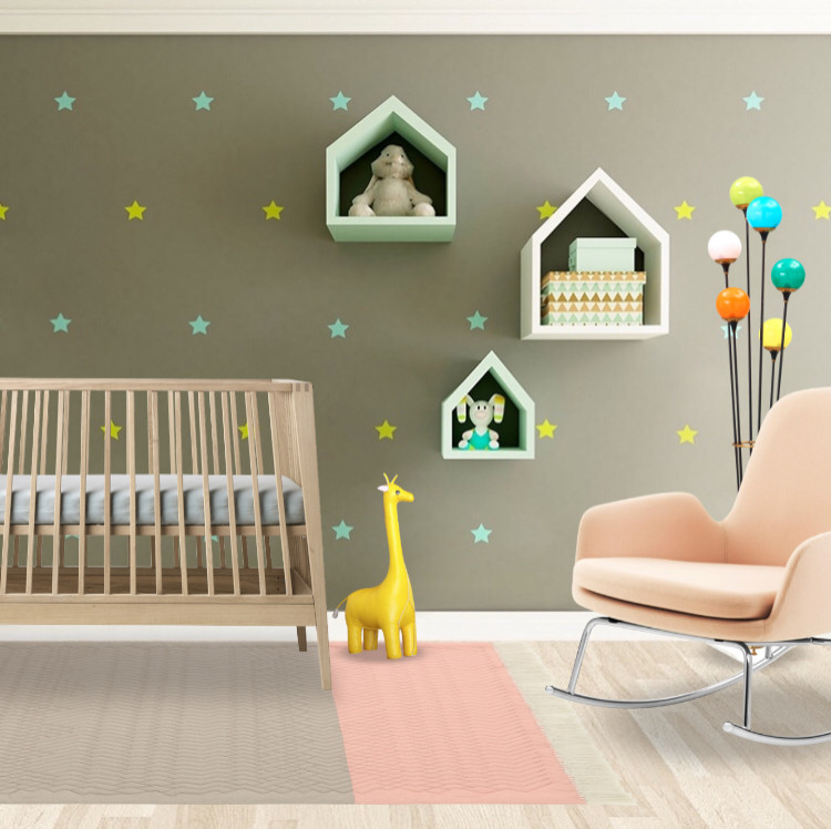 Small modern nursery in Other with multi-coloured walls, light hardwood floors and beige floor for girls.