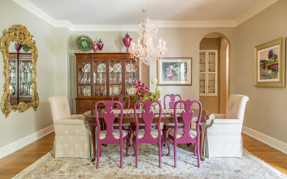 Photo of a large traditional open plan dining in Other with beige walls and light hardwood floors.