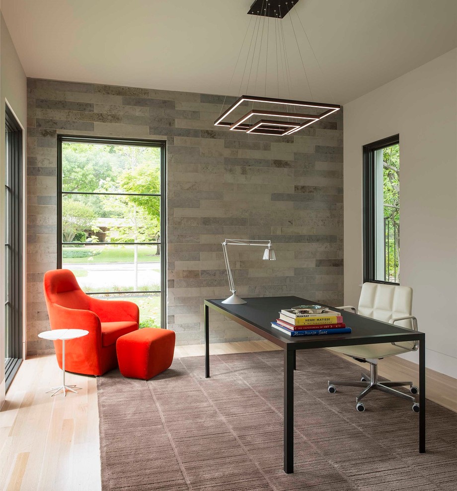 Mid-sized trendy freestanding desk light wood floor and beige floor study room photo in Dallas with white walls and no fireplace