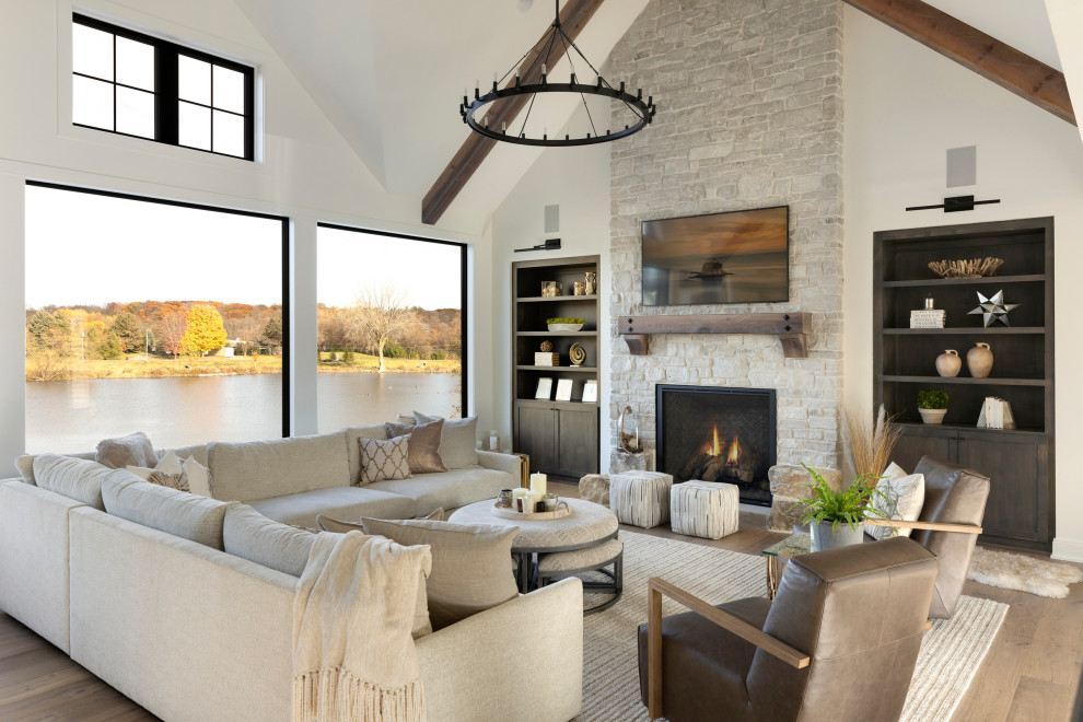 Inspiration for a transitional living room in Minneapolis with a stone fireplace surround.