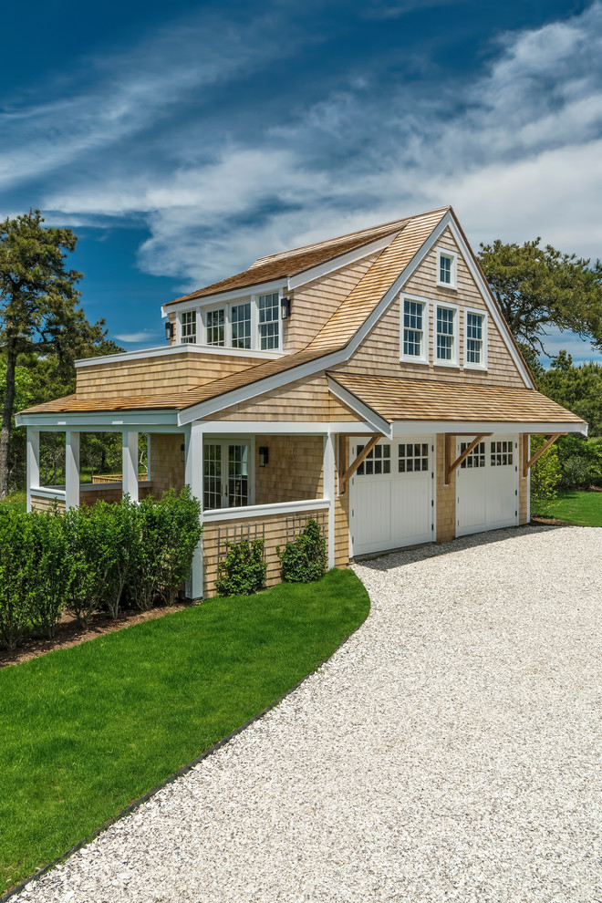 Mid-sized beach style detached two-car garage in Boston.