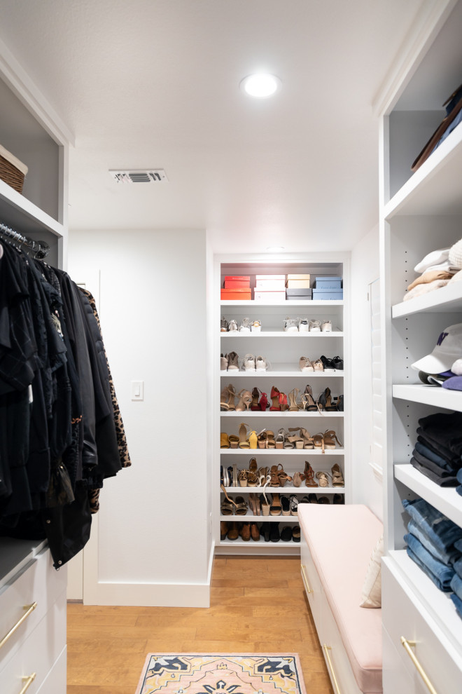 This is an example of a contemporary storage and wardrobe in Dallas.