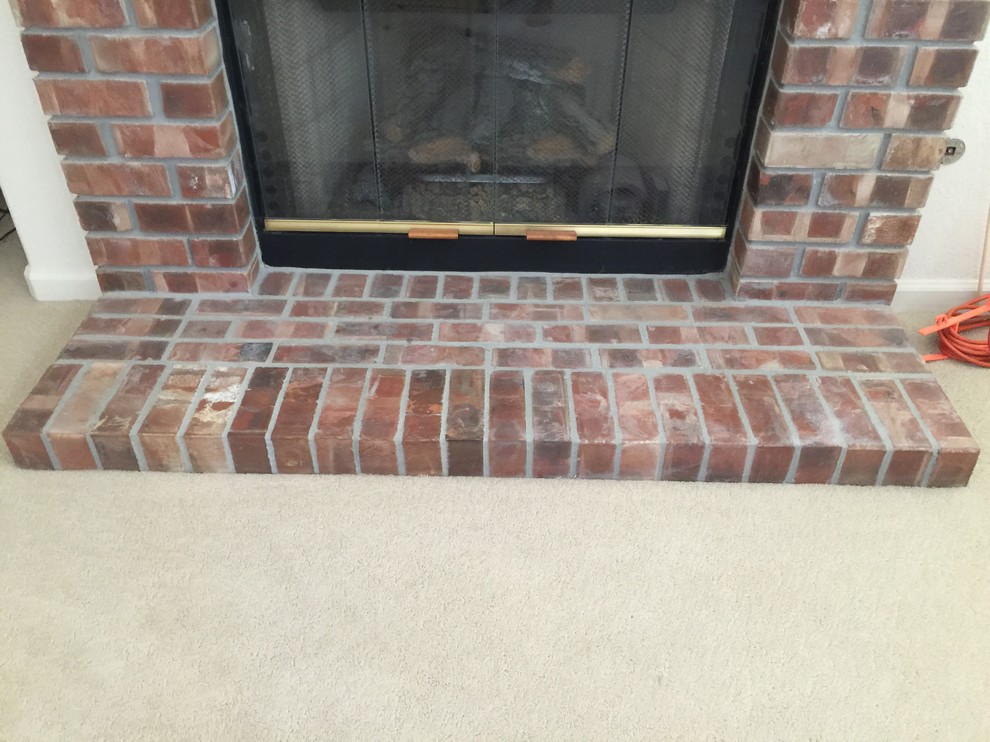 Quarter round color to use around red brick fireplace?