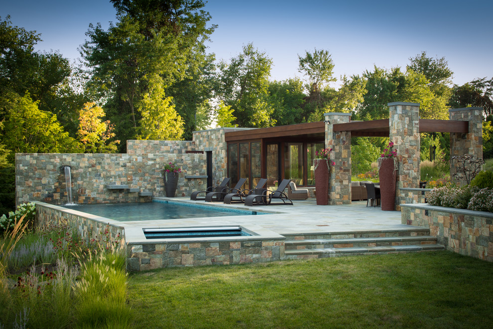 Photo of a mediterranean rectangular pool in Baltimore with a pool house.
