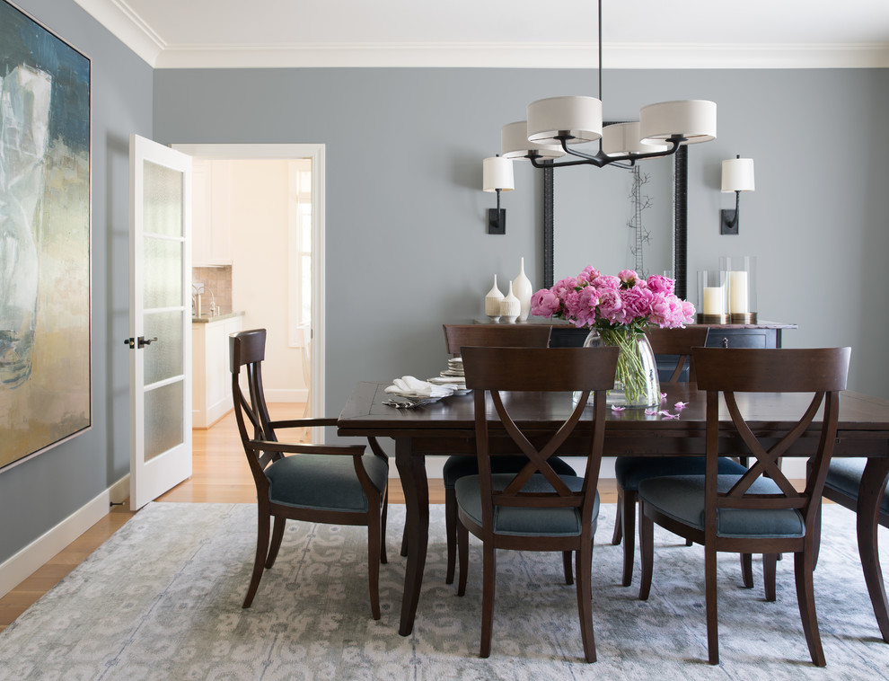 Inspiration for a mid-sized transitional separate dining room in San Francisco with grey walls, light hardwood floors, no fireplace and beige floor.