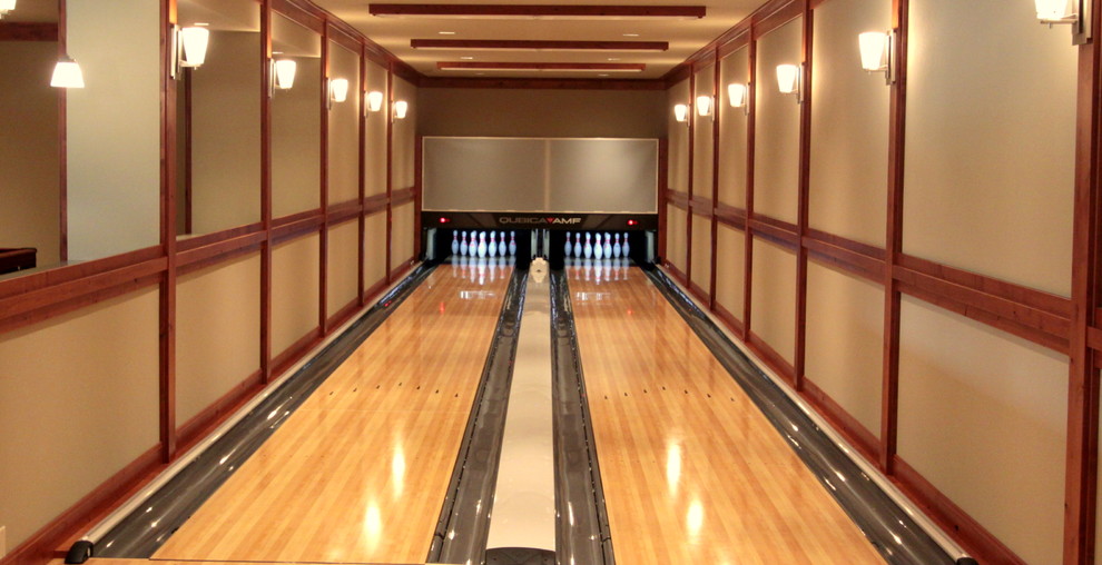Bowling Alley Eclectic Basement Seattle by Concept Builders, Inc.