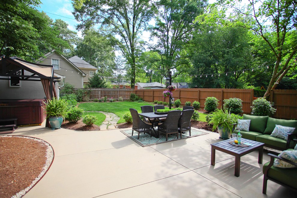 Design ideas for a mid-sized modern backyard patio in Charlotte with no cover.