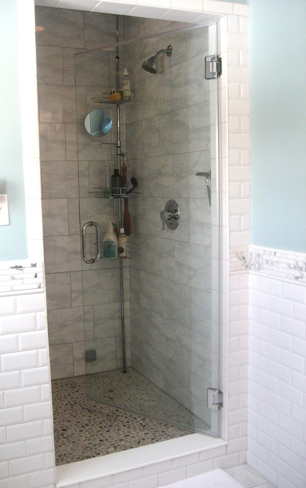 Double shower - large transitional master white tile porcelain tile double shower idea with an undermount sink, open cabinets, medium tone wood cabinets, a one-piece toilet and blue walls