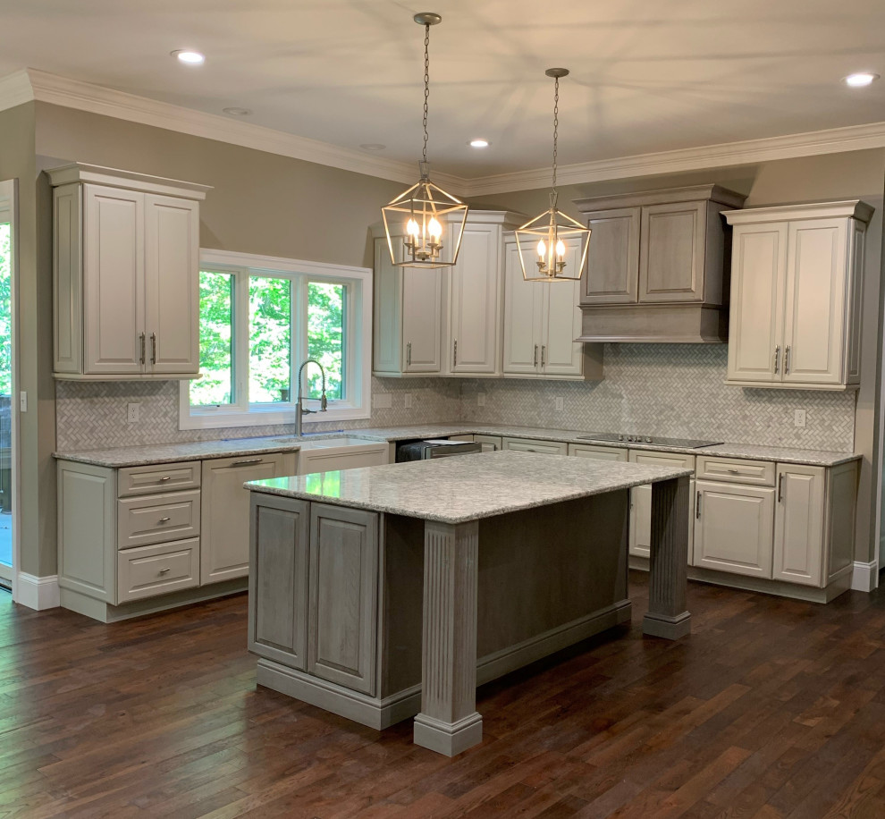 Inspiration for a transitional kitchen remodel with raised-panel cabinets and gray cabinets