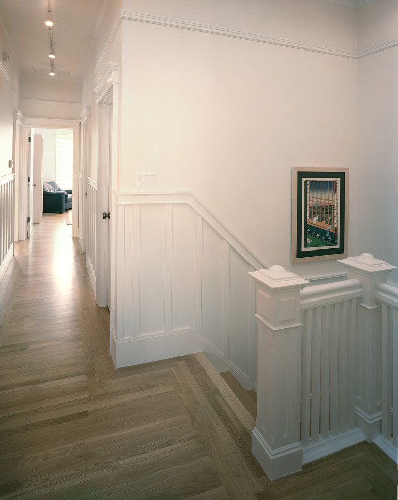Inspiration for a small traditional wood u-shaped staircase in San Francisco with wood risers.