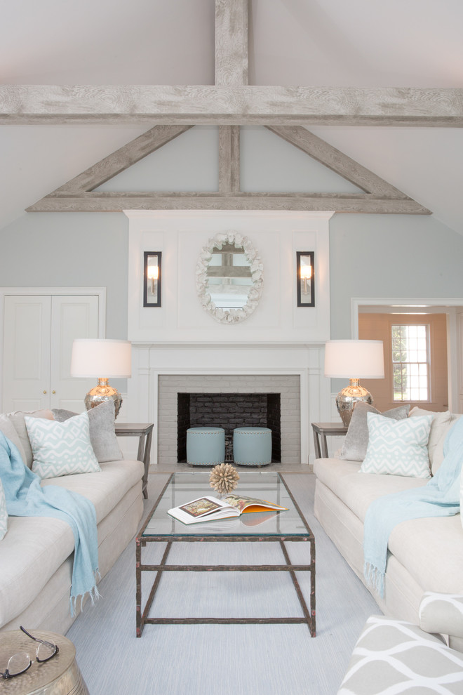 Design ideas for a beach style formal living room in Boston with grey walls, a standard fireplace and a brick fireplace surround.