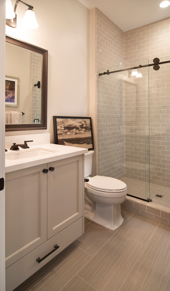 Design ideas for a transitional bathroom in San Francisco with recessed-panel cabinets and grey cabinets.