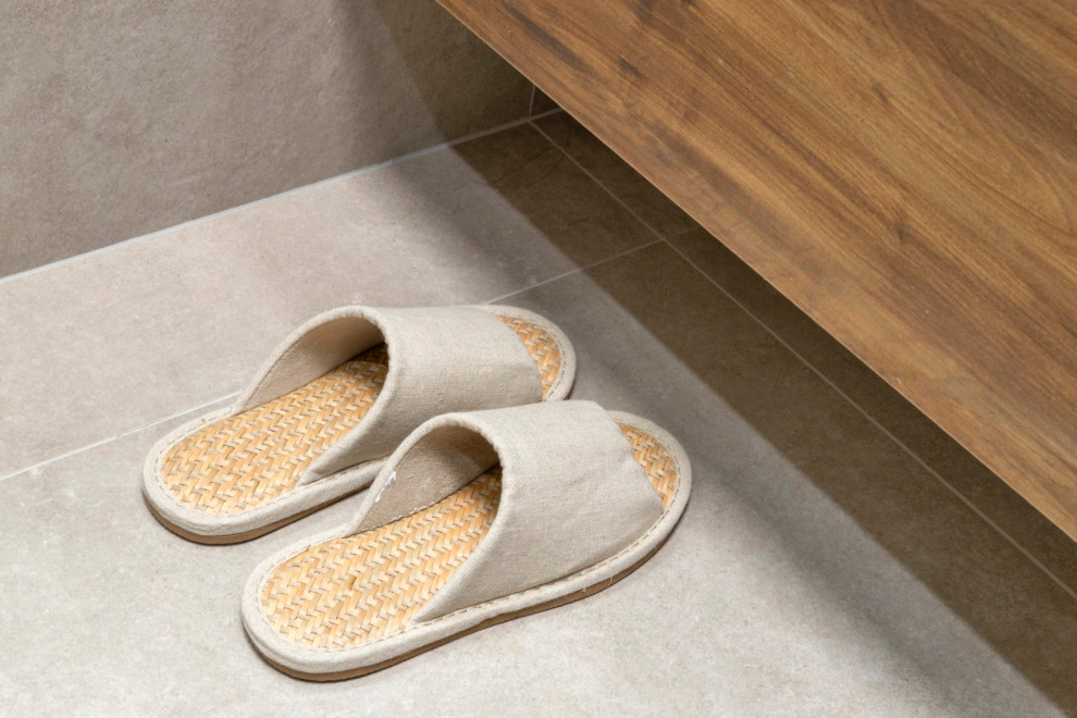 Large trendy master beige tile and porcelain tile porcelain tile, beige floor and double-sink bathroom photo in Melbourne with flat-panel cabinets, medium tone wood cabinets, a floating vanity, a vessel sink, quartz countertops and white countertops