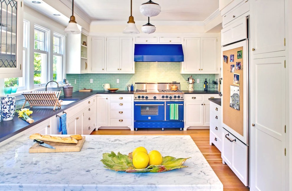 Inspiration for a traditional u-shaped separate kitchen in Seattle with subway tile splashback, an undermount sink, recessed-panel cabinets, white cabinets, marble benchtops, green splashback, coloured appliances and blue benchtop.