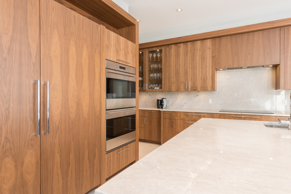 Example of a transitional kitchen design in Toronto