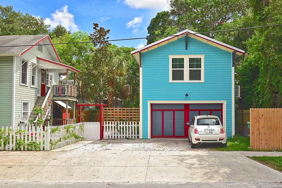 Inspiration for a beach style detached two-car workshop in Tampa.