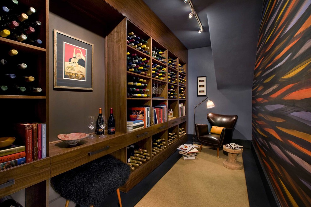 Design ideas for a contemporary wine cellar in San Francisco with carpet, storage racks and beige floor.