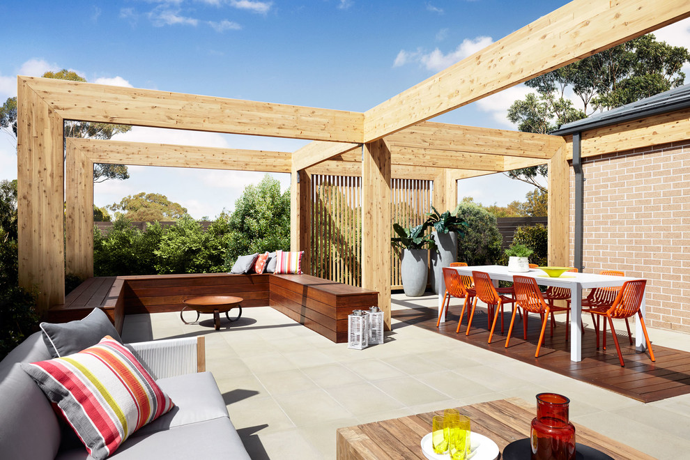 Design ideas for a large contemporary patio in Melbourne with a pergola.