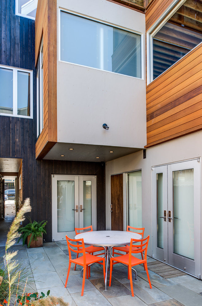 This is an example of a mid-sized contemporary patio in San Francisco with no cover.