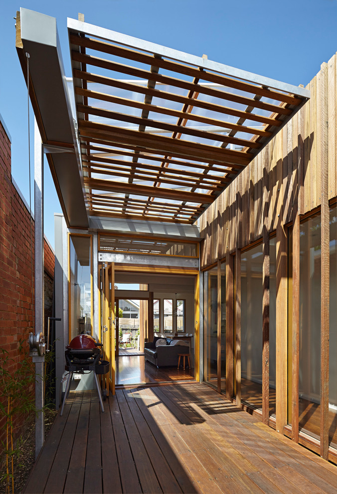 Inspiration for a contemporary deck in Melbourne with a pergola.