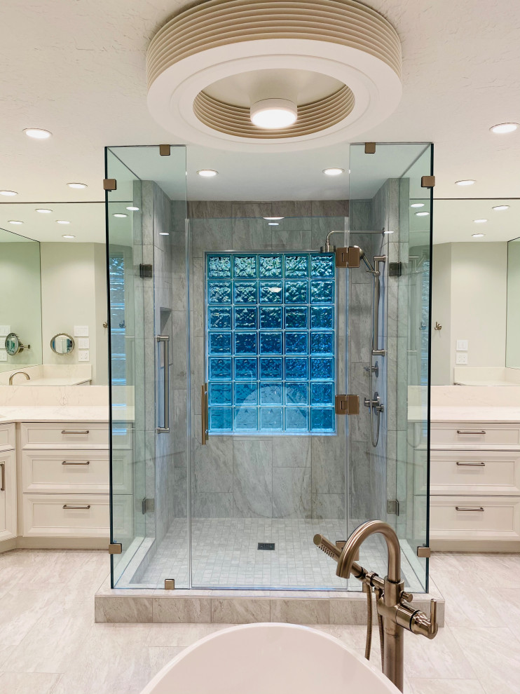 Alcove shower - huge modern master porcelain tile and gray tile porcelain tile, double-sink and gray floor alcove shower idea in Houston with recessed-panel cabinets, white cabinets, quartz countertops, a hinged shower door, white countertops, a built-in vanity and gray walls