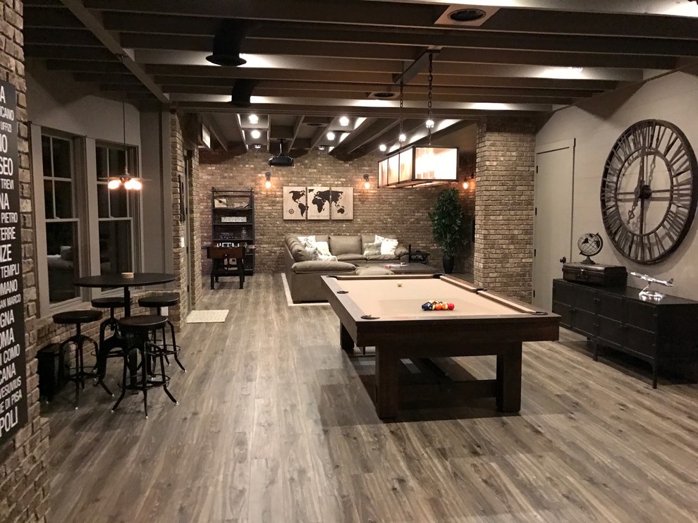 Photo of a large country basement in Atlanta with brown walls, medium hardwood floors, no fireplace and brown floor.