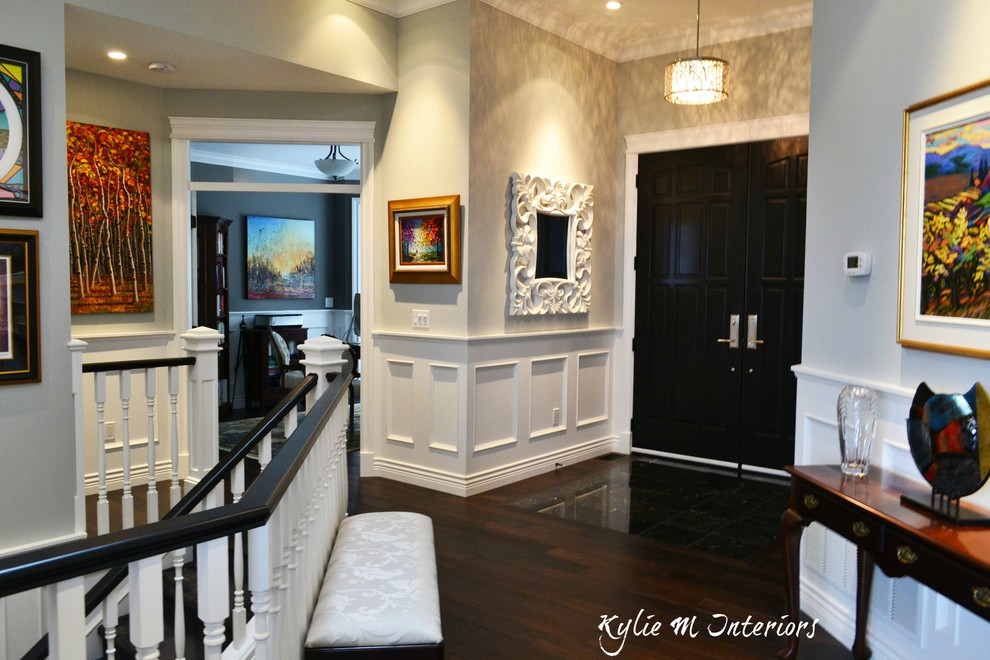 Design ideas for a mid-sized transitional foyer in Vancouver with grey walls, dark hardwood floors, a double front door and a black front door.