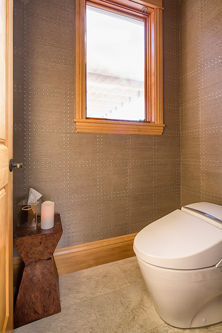 Example of a transitional powder room design in Denver