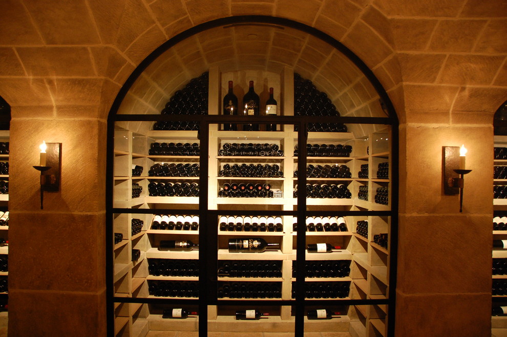 Design ideas for an expansive mediterranean wine cellar in Sacramento.