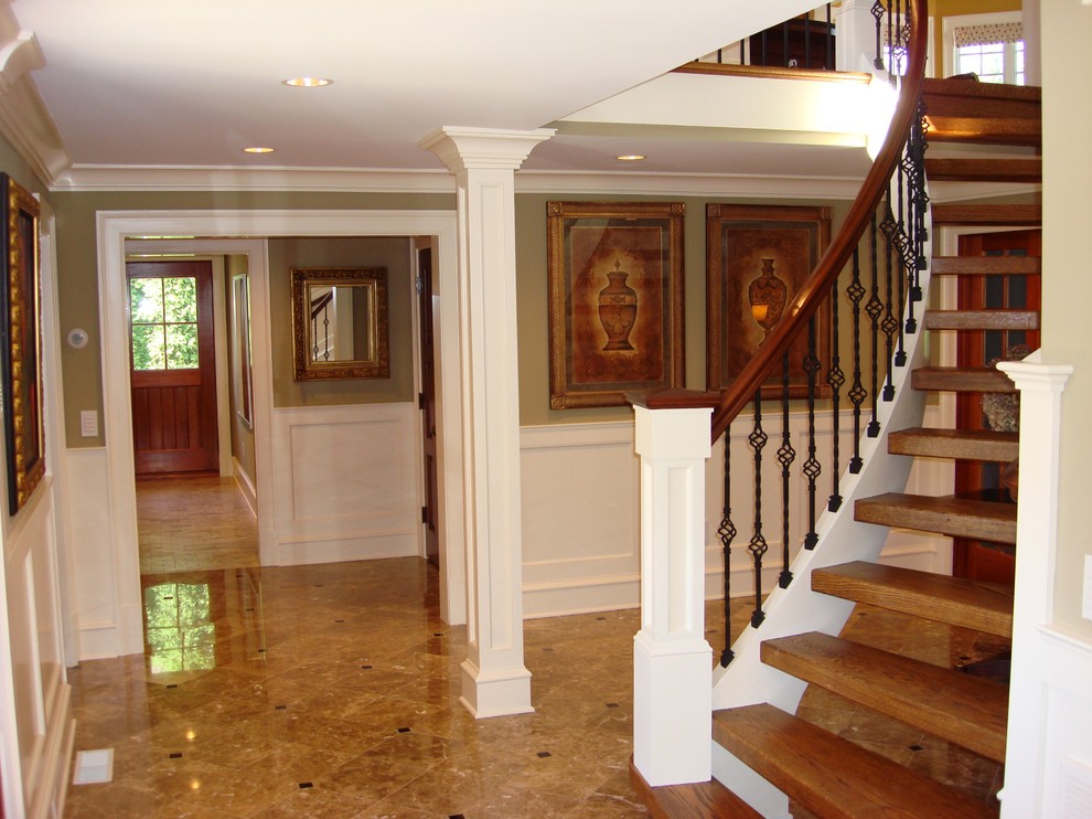 Mid-sized traditional wood floating staircase in Bridgeport.