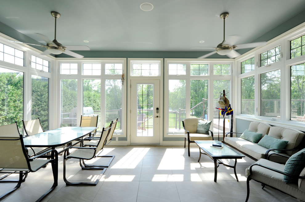 Photo of a mid-sized traditional sunroom in Toronto with porcelain floors, a standard ceiling and no fireplace.