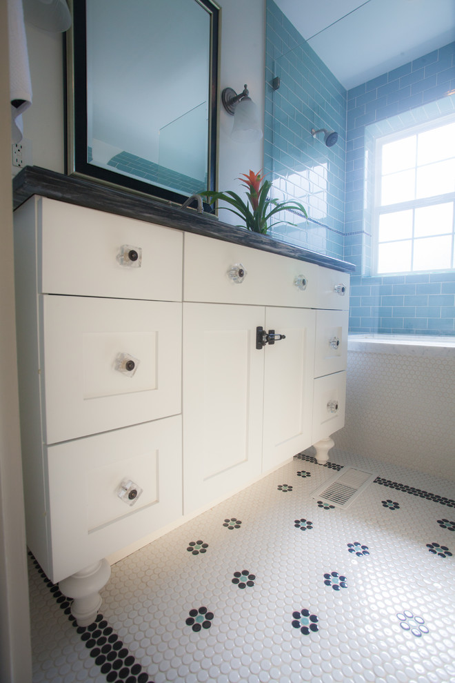 Inspiration for a small traditional master bathroom in Salt Lake City with white cabinets, marble benchtops, an undermount tub, a shower/bathtub combo, blue tile, white walls, ceramic floors, an undermount sink, shaker cabinets, glass tile, white floor and a shower curtain.