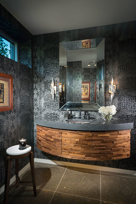 This is an example of a mid-sized contemporary powder room in Other with grey cabinets, grey walls, porcelain floors, an undermount sink, quartzite benchtops, grey floor and grey benchtops.