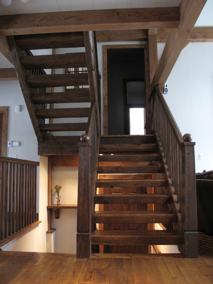 Inspiration for a rustic staircase remodel in Montreal