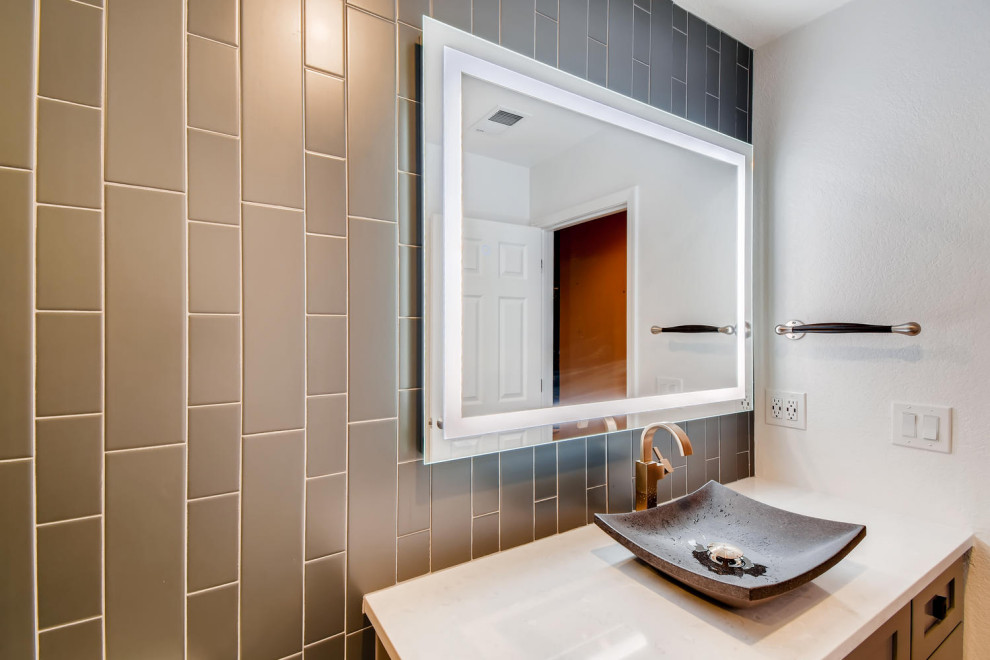 Inspiration for a mid-sized transitional 3/4 bathroom in Denver with shaker cabinets, white cabinets, an open shower, gray tile, ceramic tile, grey walls, a vessel sink, engineered quartz benchtops, a hinged shower door, white benchtops, a shower seat, a single vanity and a built-in vanity.