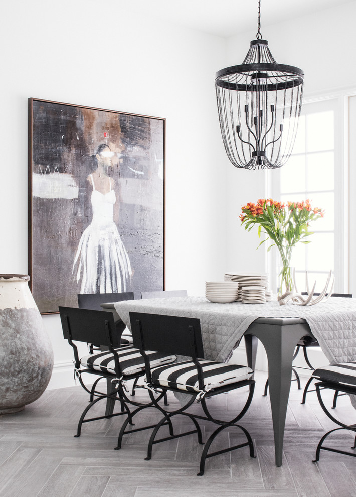 Inspiration for a large contemporary dining room in Orlando with white walls, no fireplace, grey floor and porcelain floors.