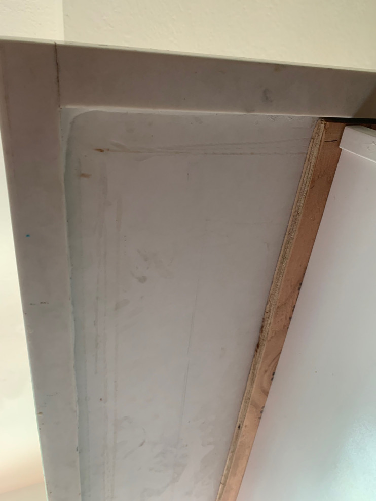8 inch gap between end of quartz countertop and plywood underlayment