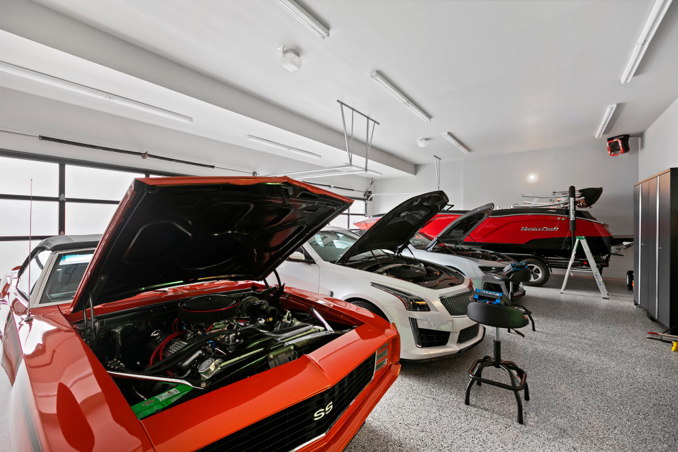 Inspiration for a huge attached four-car garage remodel in Seattle