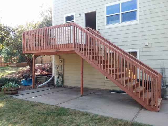 12x8 redwood tone Elevated Deck Build american-traditional-terrace