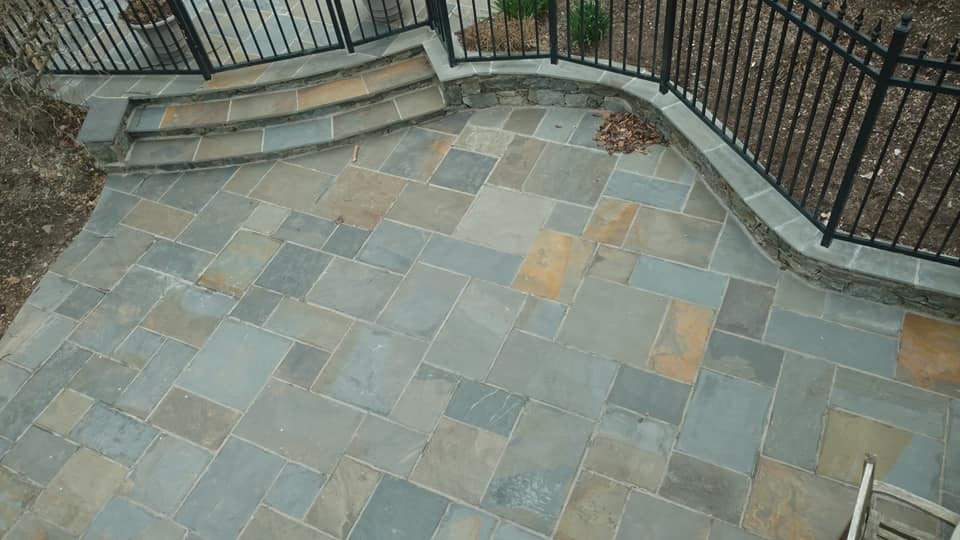 Example of a huge transitional backyard stone and kidney-shaped natural pool design