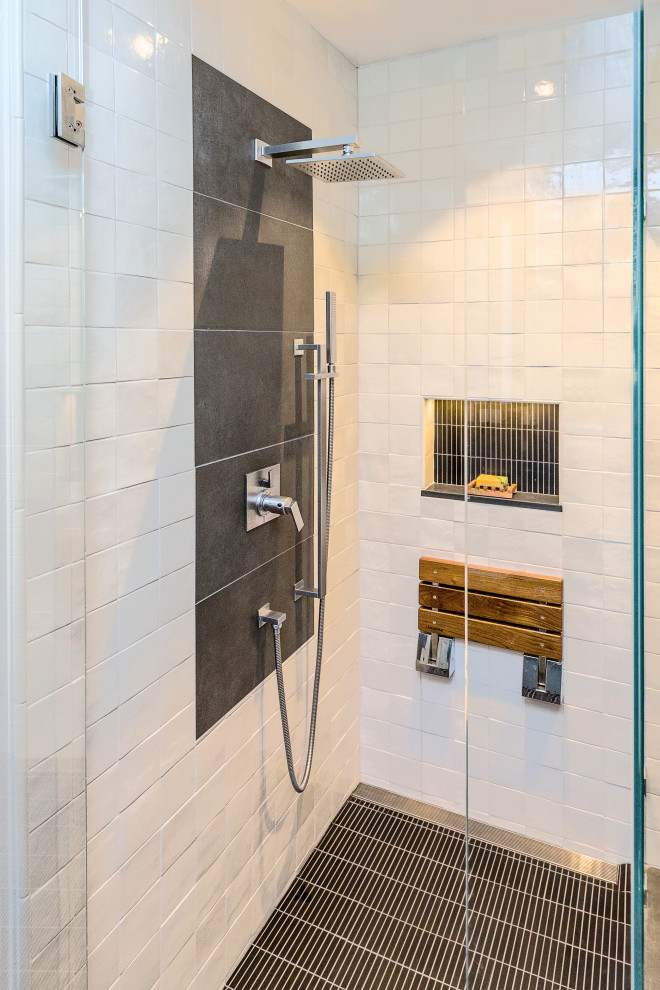 This is an example of a small midcentury master bathroom in Santa Barbara with flat-panel cabinets, black cabinets, a curbless shower, a bidet, gray tile, terra-cotta tile, grey walls, slate floors, an undermount sink, engineered quartz benchtops, grey floor, a hinged shower door, black benchtops, a niche, a double vanity and a built-in vanity.